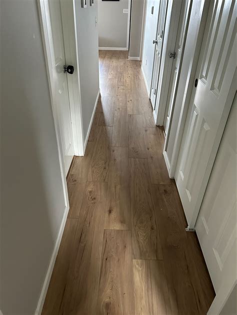 how much to replace carpet with laminate
