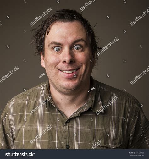 Crazy Man With Messed Up Hair And Wild Eyes Staring At The Camera Stock ...