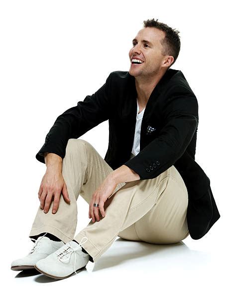 men sitting  floor sitting floor stock  pictures