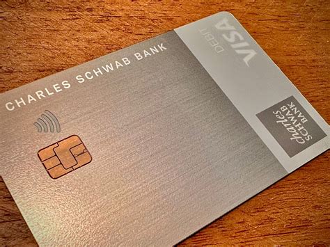 charles schwab debit card    option  travelers