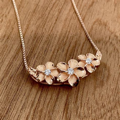 plumeria flowers slider bar pendant gold jewelry stores black beads
