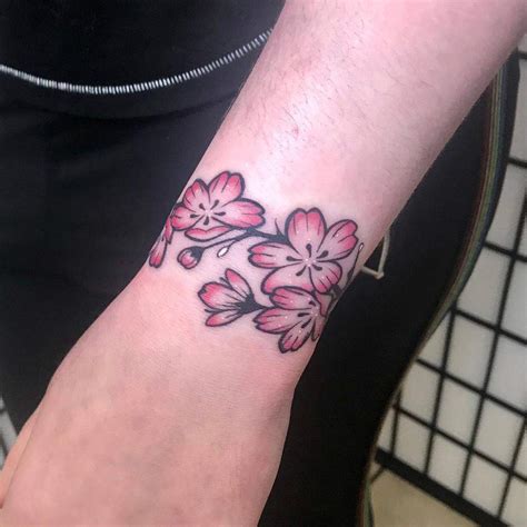 Elegant Flower Wrist Tattoo Ideas for a Delicate Look