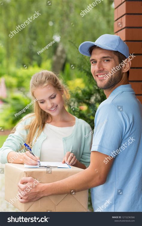 Happy Customer Signing Receipt Box Delivery Stock Photo 1215236566 ...