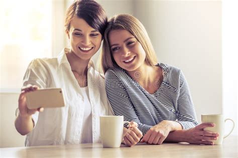 Girls with gadget stock photo. Image of holiday, laugh - 75521554