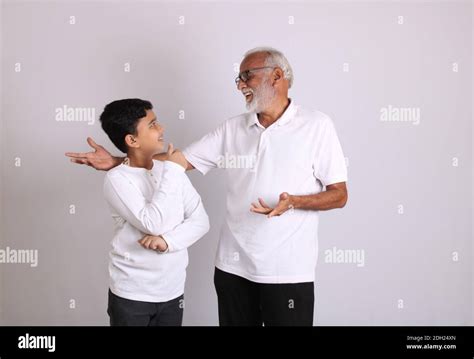Happy Indian grandfather and grandson spending quality time Stock Photo ...