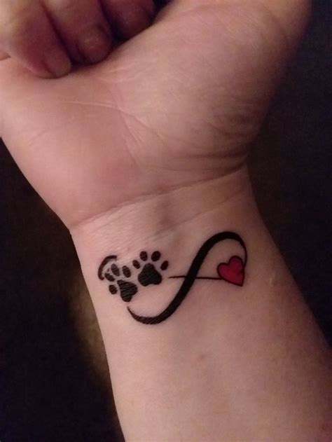 Pin on Pawprint tattoo | Pawprint tattoo, Infinity tattoo designs ...