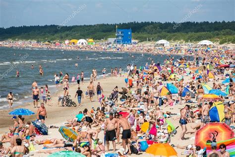 People on beach in Palanga – Stock Editorial Photo © mazzzur #55357183