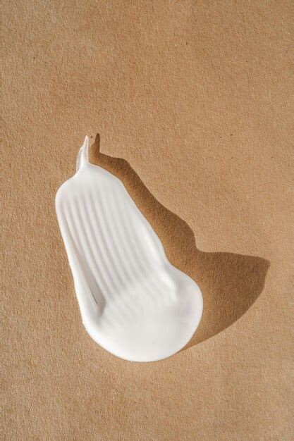 premium photo  texture   white cream   beige background
