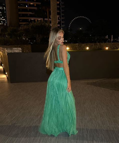 Beaux Raymond Poses Barefoot In Her Cut-Out Yellow Swimsuit