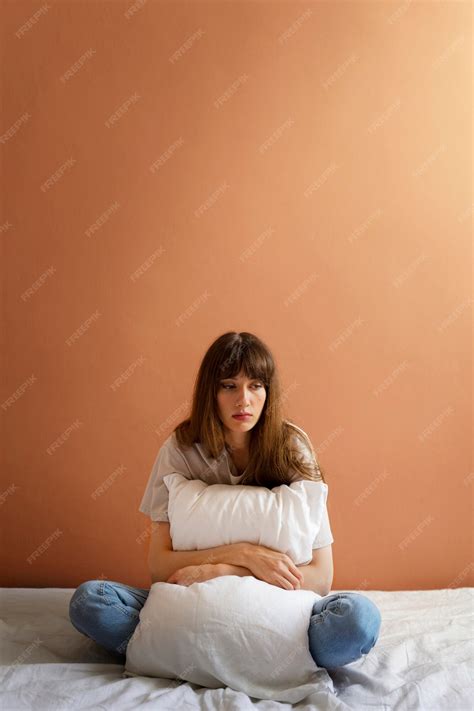 Free Photo | Insecure woman at home full shot