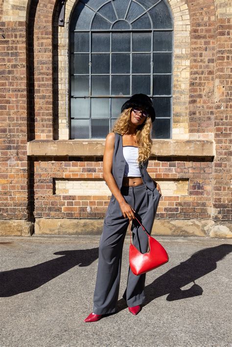 Grey suit outfit, fluffy hat and red accessories, Australian Fashion