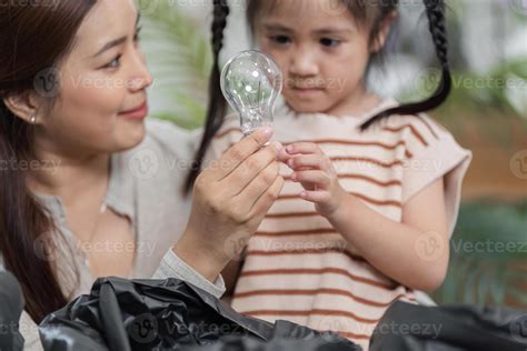 Learning About Sustainability and Recycling. A mother explains the