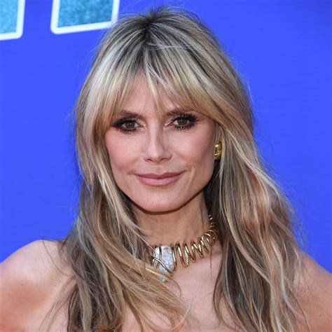 Heidi Klum Rocks Ripped Jeans And Plunging White Tank Top In New