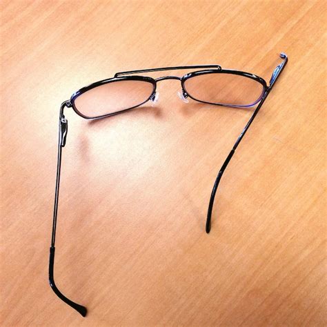 premium photo high angle view  broken eyeglasses