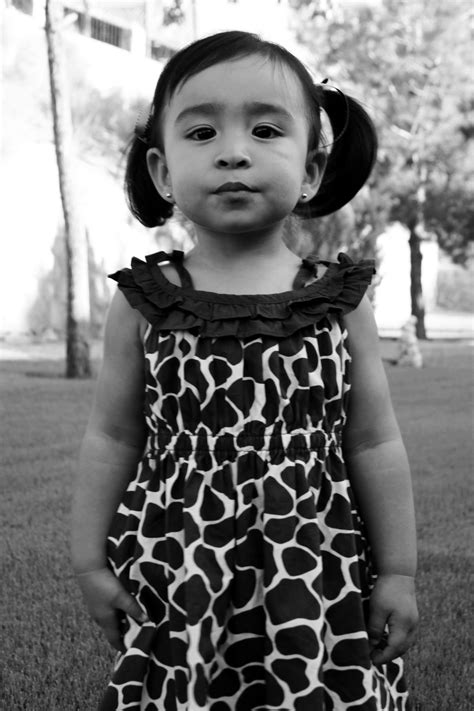 Small girl in a giraffe print dress. | Smithsonian Photo Contest | Smithsonian Magazine