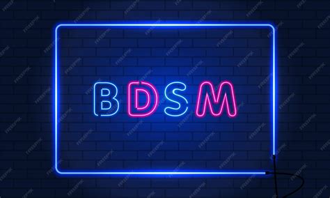 enseigne au neon bdsm dans  cadre sur fond de mur de briques panneau