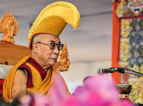 dalai  apologizes   exchange   child tricycle