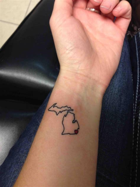 on Friday I got a tattoo of the mitten. Michigan love! : Michigan