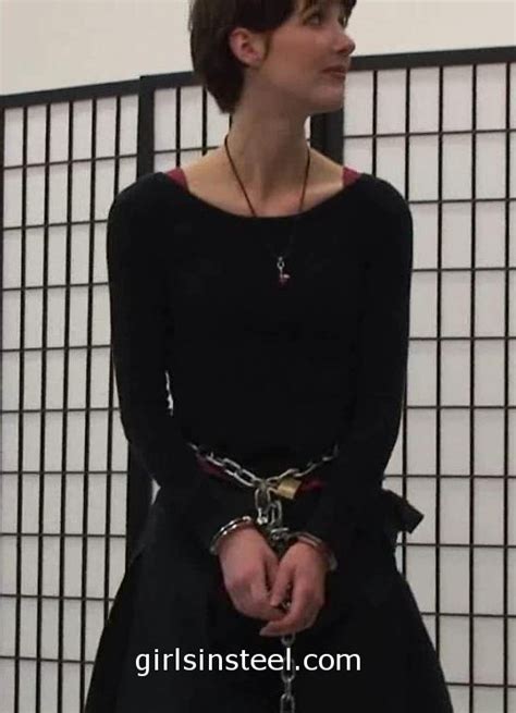 Bianca´s Rigidcuffs: Girl in transport chains