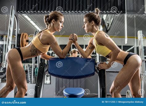 Two Young Fitness Woman, Arm Wrestling in Gym Stock Image - Image of sportsman, coaching: 78111255