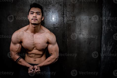 Portrait of asian man big muscle at the gym,Thailand people,Workout for
