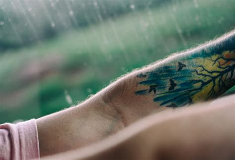 snake hand tattoo