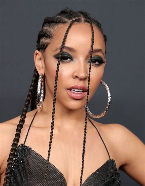 Tinashe – Sexy Braless Boobs in See-Through Top at Spotify Best New