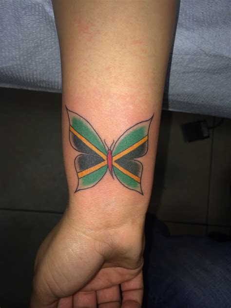 My Jamaican flag butterfly tattoo on my wrist sooo in love! | Jamaican ...