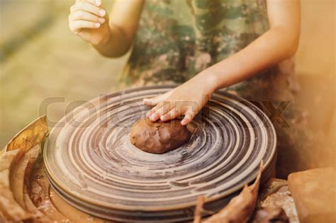 Child learning clay modeling | Stock image | Colourbox
