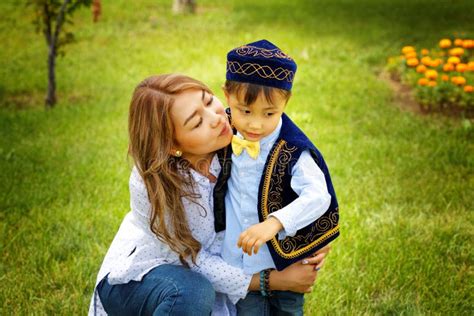 Kazakh Little Boy and Girl Together Playing Stock Image - Image of ...