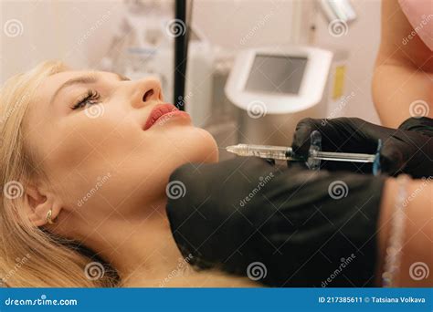 changing contour  woman face procedure hyaluronic acid injections