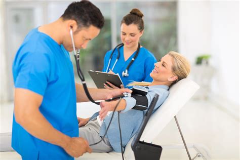 Nurse Assessing Baby
