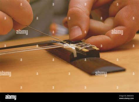 Broken guitar string hi-res stock photography and images - Alamy