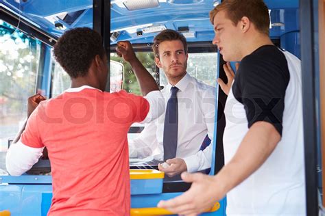 Passengers Arguing With Bus Driver | Stock image | Colourbox