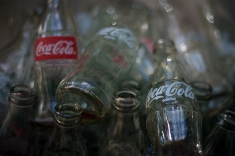 coke bottles  stock photo  rupert punsalan  stockvaultnet