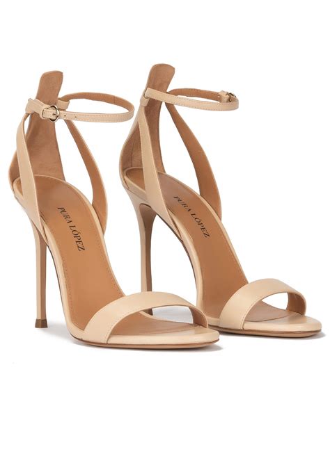 Ankle strap high heel sandals in beige leather . PURA LOPEZ