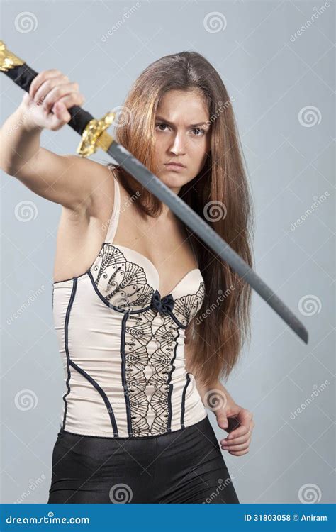 Woman With Sword Fighting Royalty Free Stock Photos - Image: 31803058