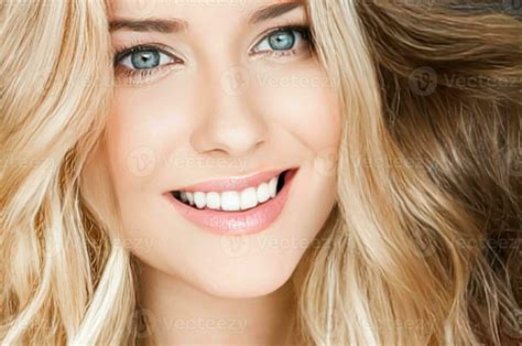 Beautiful blonde woman smiling, white teeth smile 26655626 Stock Photo