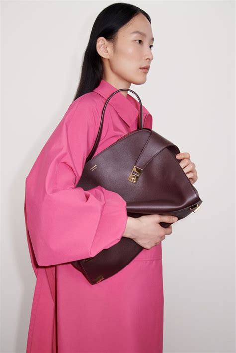 ferragamo hug bag   relaxed update purseblog