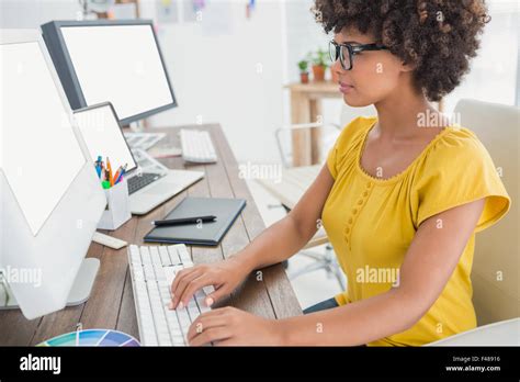 Graphic designer using a computer Stock Photo - Alamy