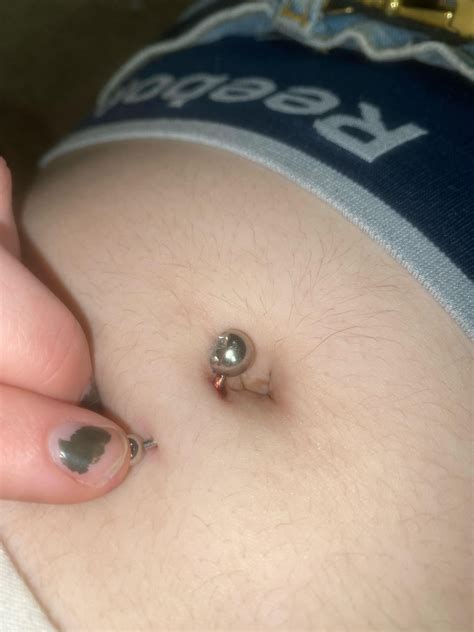 navel piercing still bleeding after 2 months? : r/piercing