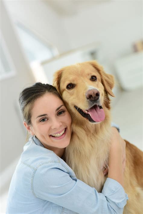 Young woman petting her dog - Prescott, AZ Animal Communicator | Animal ...