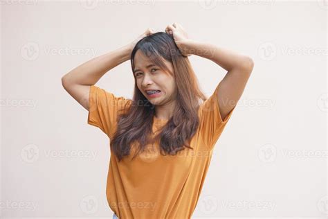 asian woman  itchy head  dandruff  stock photo