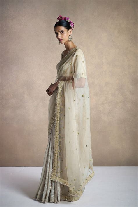 beige embroidered buti sari anavila