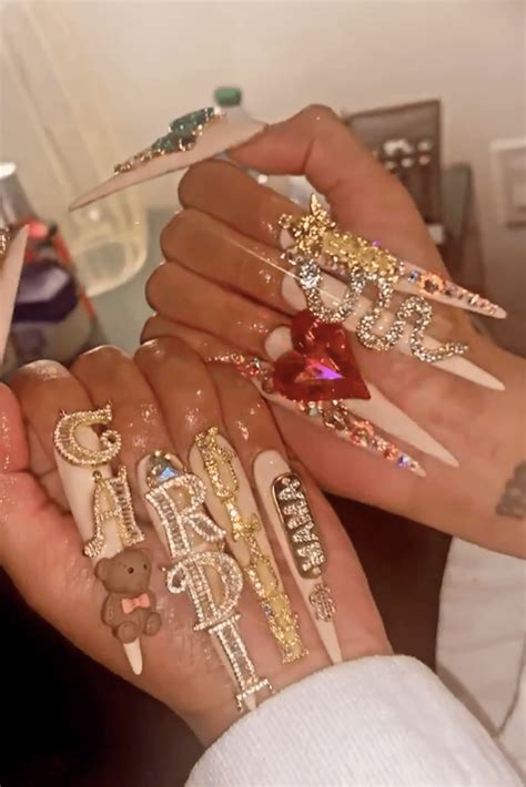 Pregnant Cardi B unveils insane diamond-covered acrylic nails