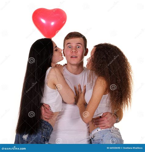 Two Young Women Kissing To the Man. Stock Photo - Image of copy