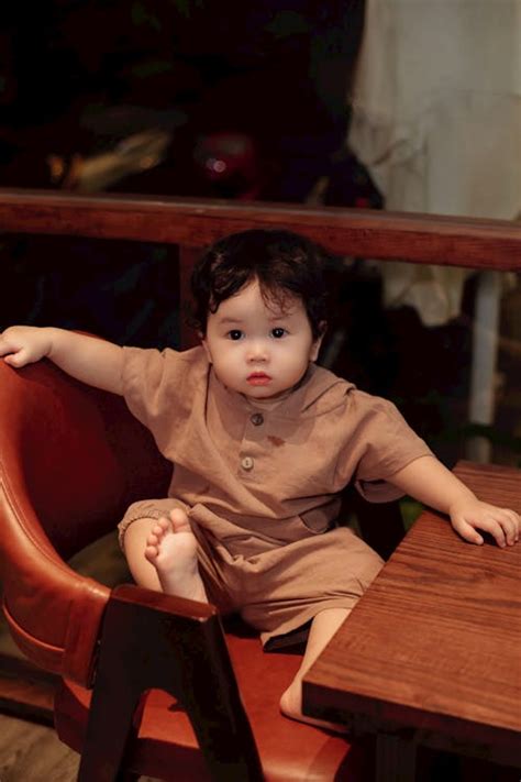 child sitting  chair  stock photo