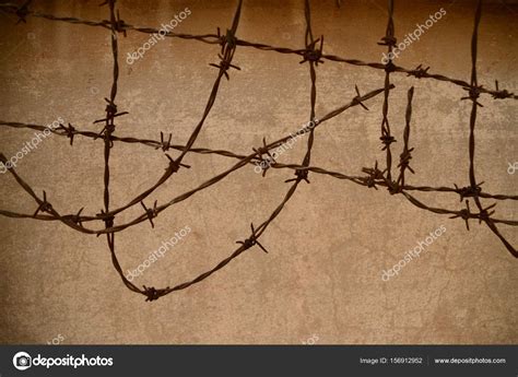 barbed wire oppression symbol stock photo  lucief