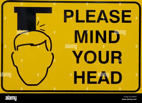 Please mind your head signage Stock Photo, Royalty Free Image ...