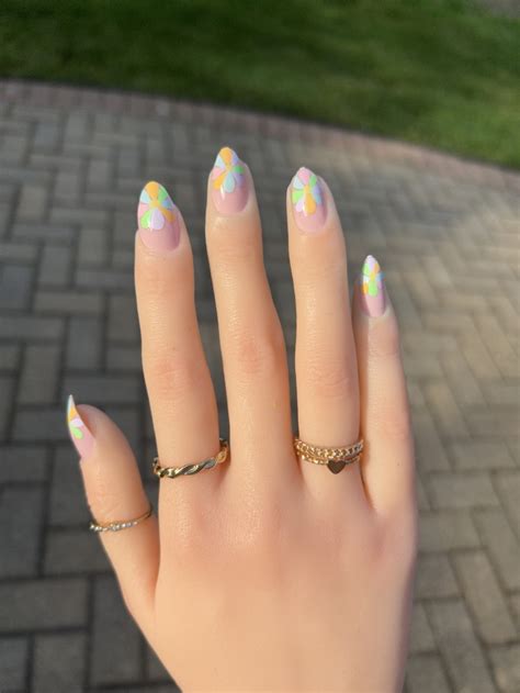 Light Pink Nails with Colorful Pastel Flowers – Vibrant Guide